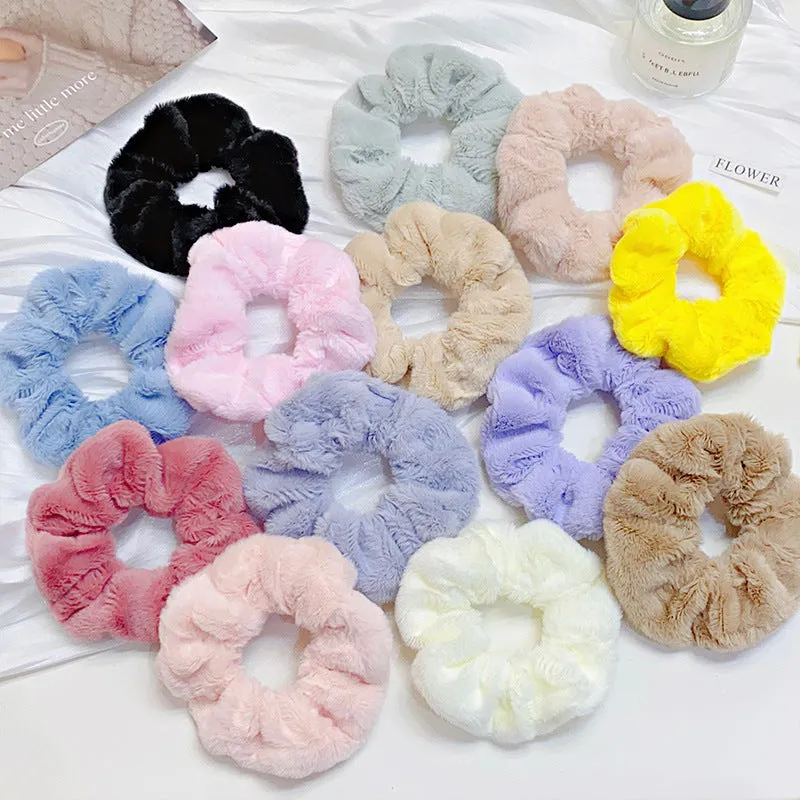 Solid colour cloth hair ring in round ring style with loose fit, available in multiple colours