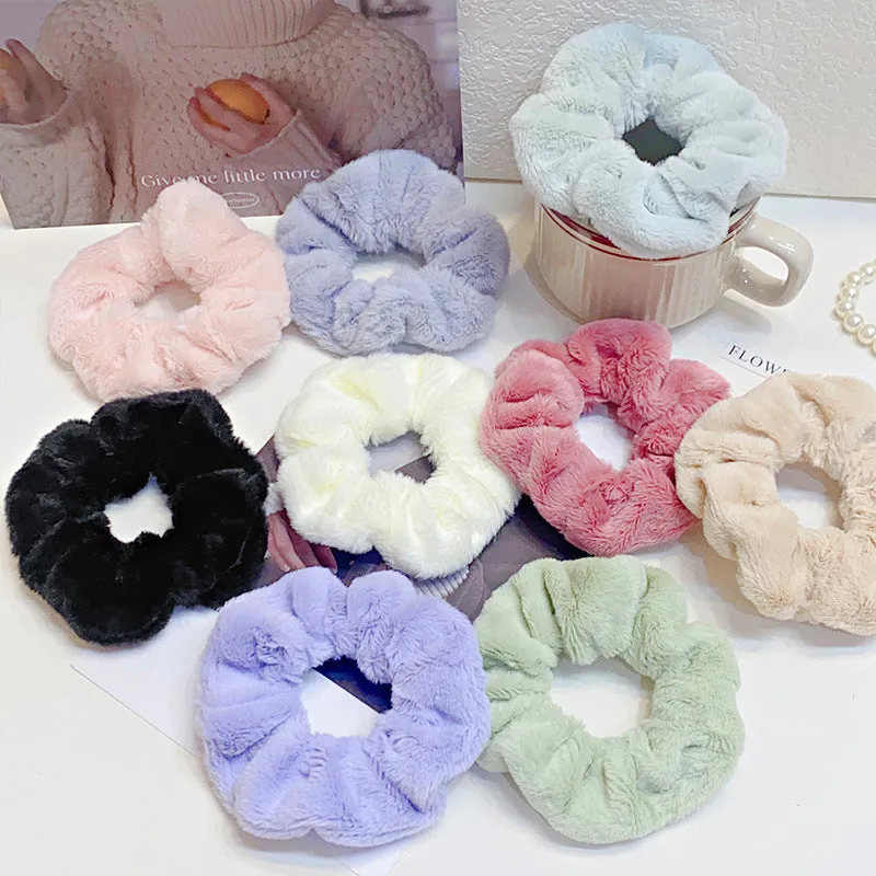 Solid colour cloth hair ring in round ring style with loose fit, available in multiple colours