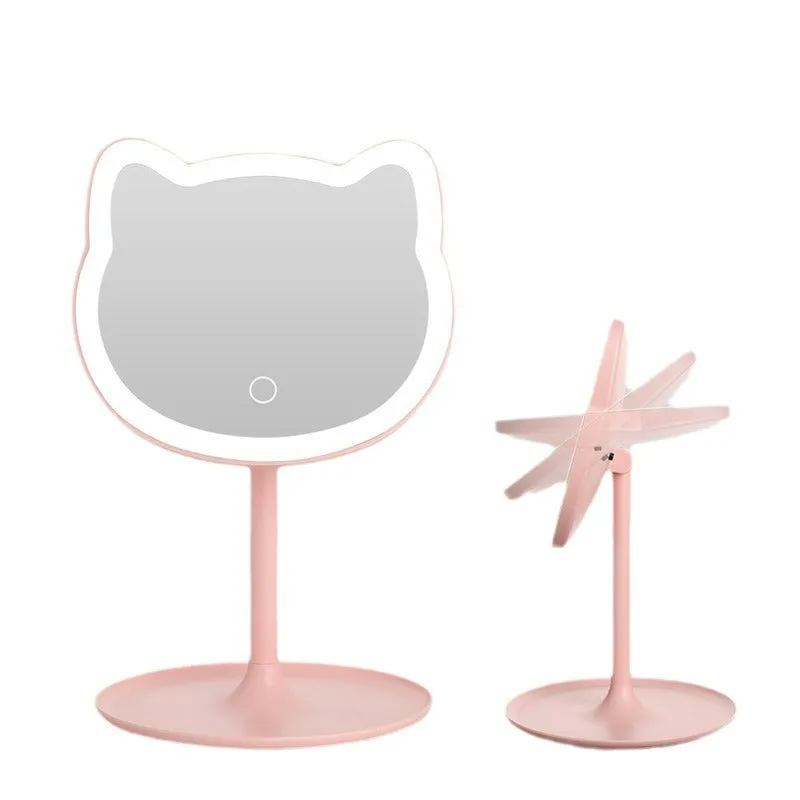 Pink rechargeable makeup mirror with fill light on a desk, ABS frame, aluminium mirror, size 14cm x 18cm