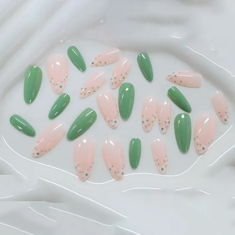 Long almond artificial nails with white little flower pattern and jelly glue rub in CW680 colour classification