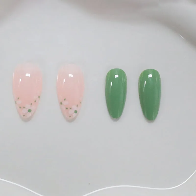 Long almond artificial nails with white little flower pattern and jelly glue rub in CW680 colour classification