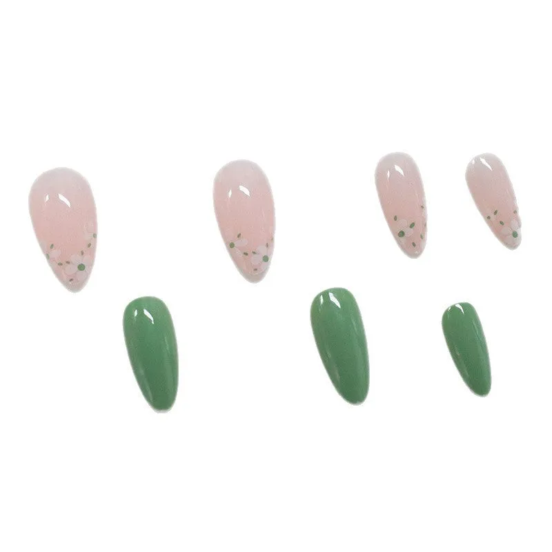 Long almond artificial nails with white little flower pattern and jelly glue rub in CW680 colour classification