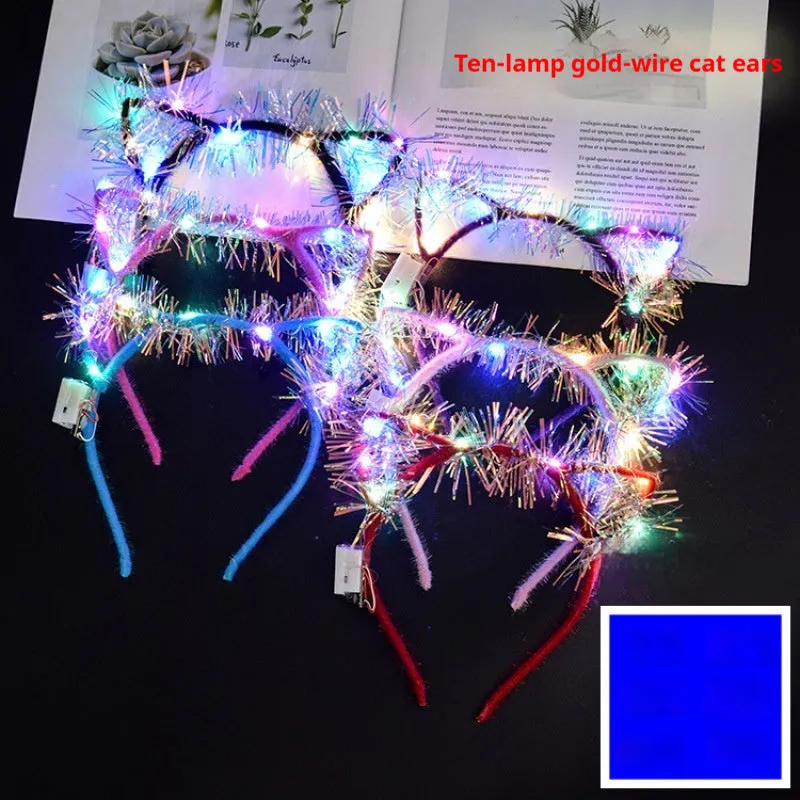 Glowing headdress antlers headband with LED lights on pink background, plastic construction with cat ears style