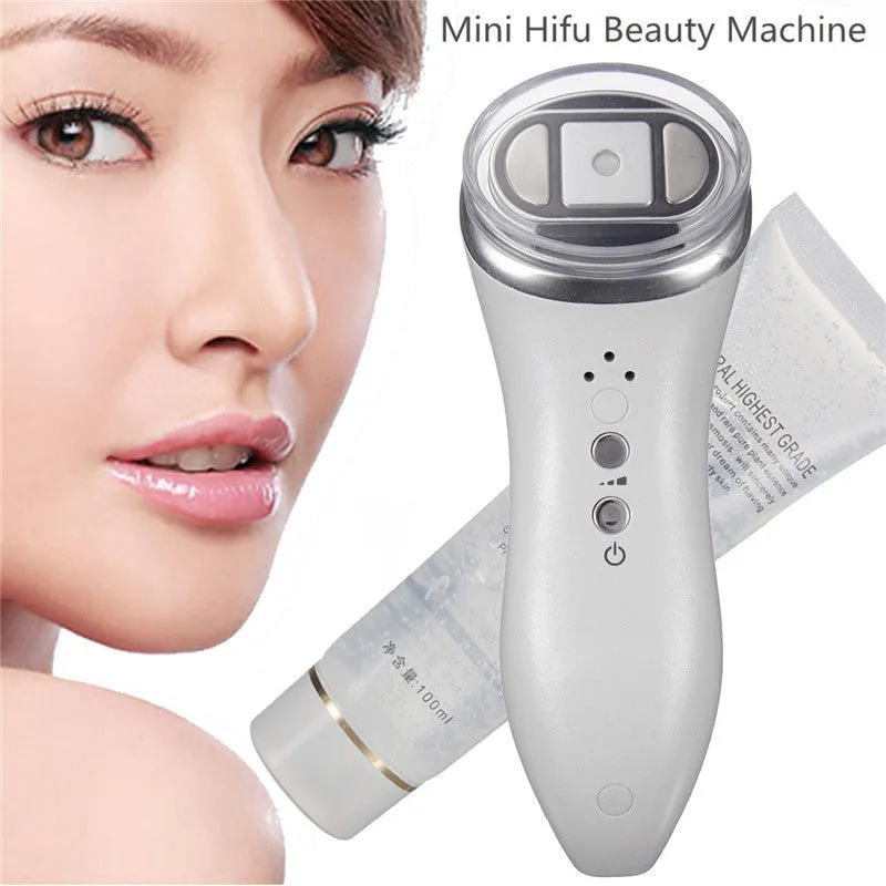 Mini ultrasonic scalpel home portable beauty device for facial firming in purple colour isolated on white background