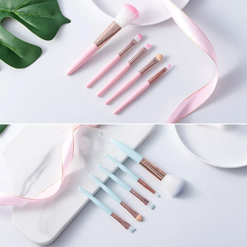 Five mini makeup brush set with plastic handles, short rod design, and man-made fiber bristles in OPP bag packaging