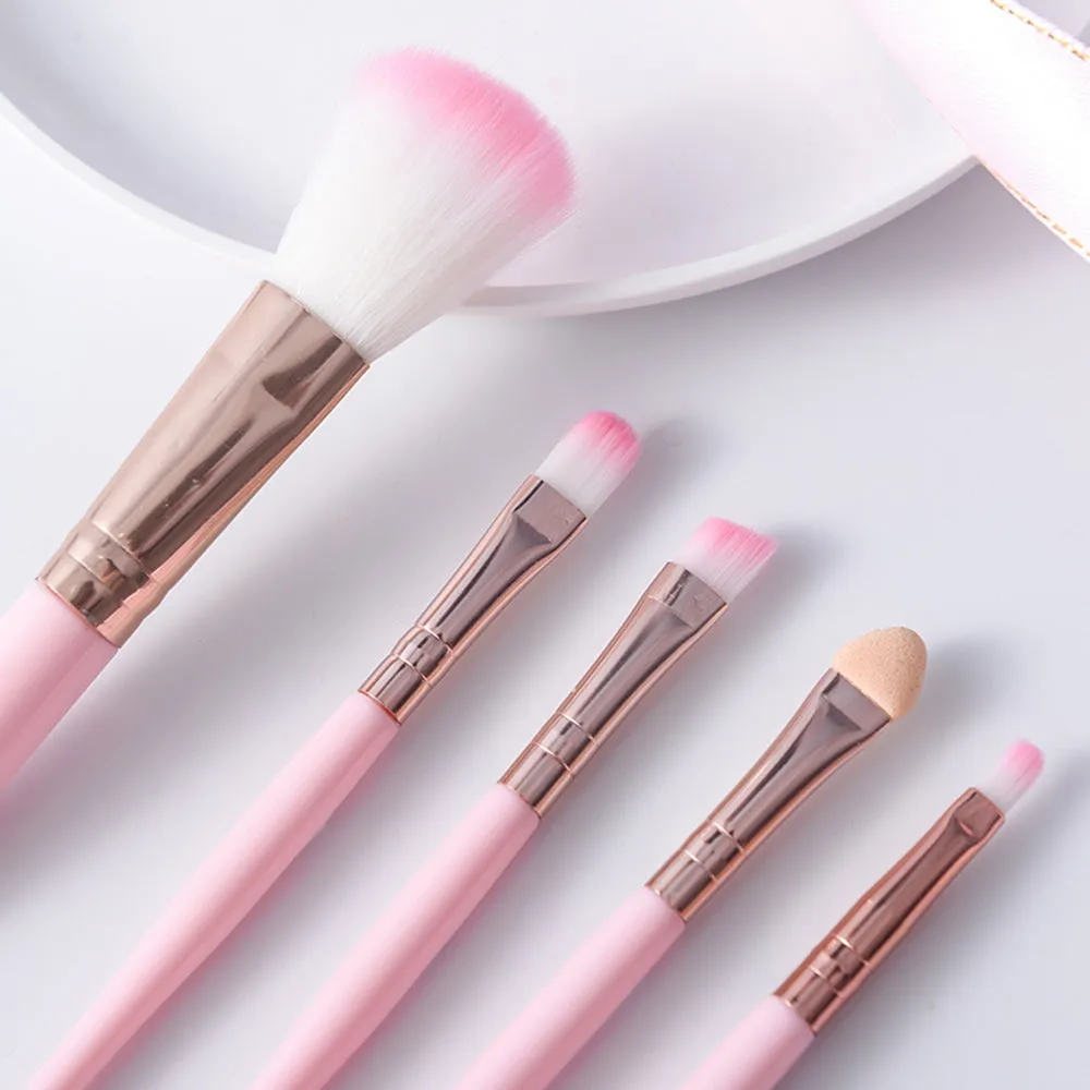 Five mini makeup brush set with plastic handles, short rod design, and man-made fiber bristles in OPP bag packaging