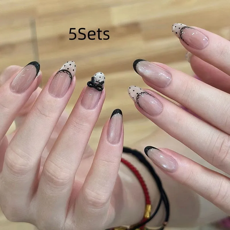 Pink artificial false nails with sweet girl illustrations, sold in sets of 5, 10, or 15.