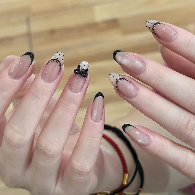 Pink artificial false nails with sweet girl illustrations, sold in sets of 5, 10, or 15.