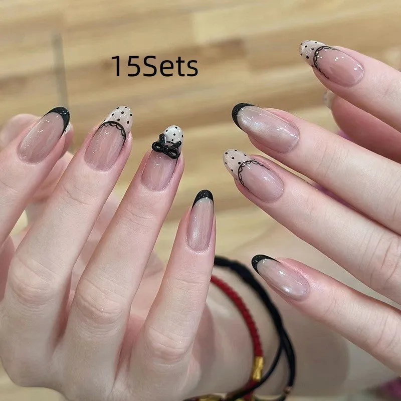 Pink artificial false nails with sweet girl illustrations, sold in sets of 5, 10, or 15.