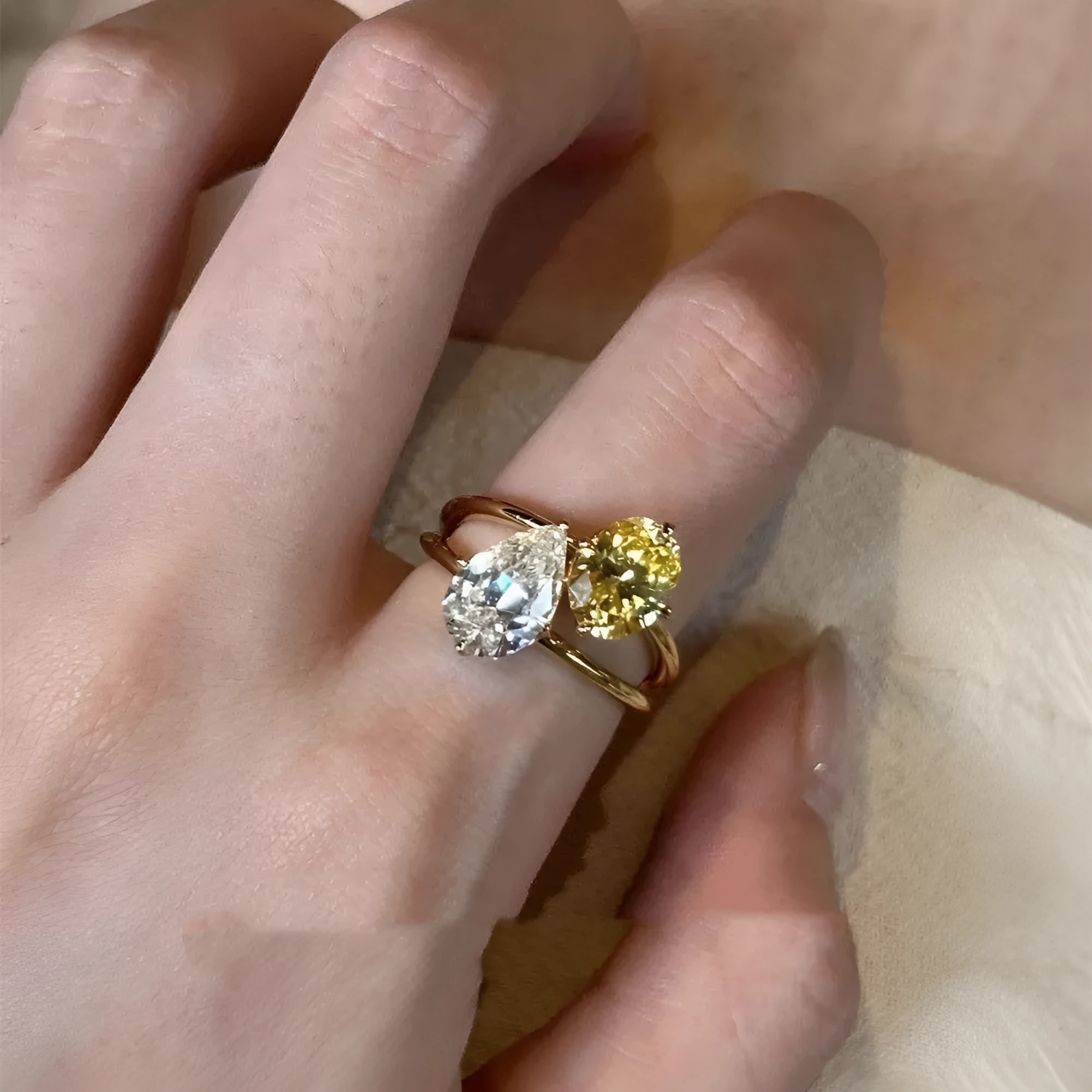 Copper open geometric ring for women with water drop contrast colour double sheng stone setting.