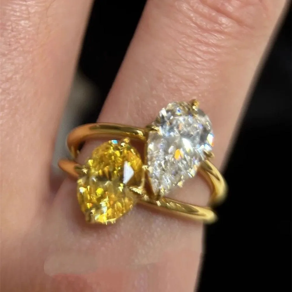 Copper open geometric ring for women with water drop contrast colour double sheng stone setting.