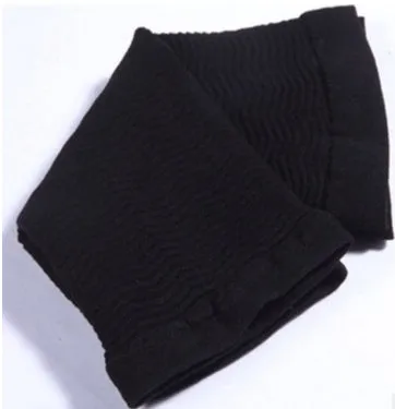 Arm and leg sleeves slimming shaper in black colour, showing wave pattern design on inner surface