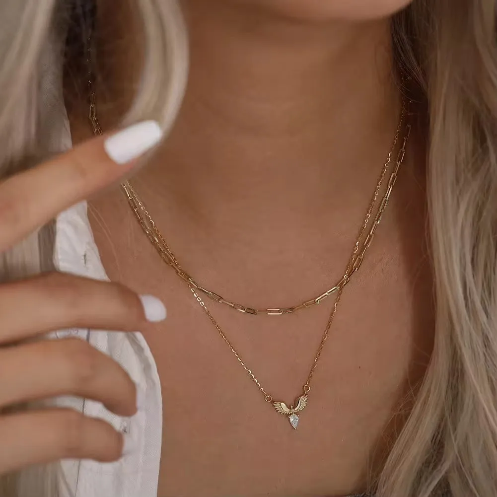 Women's silver eagle pendant necklace on an adjustable O-ring chain with white gold or yellow gold electroplating.