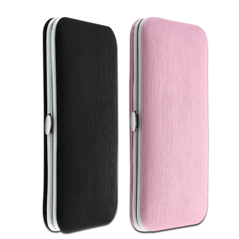 Pink 15-piece stainless steel manicure tool set in compact case measuring 15.5 by 8.2 by 1.3 cm