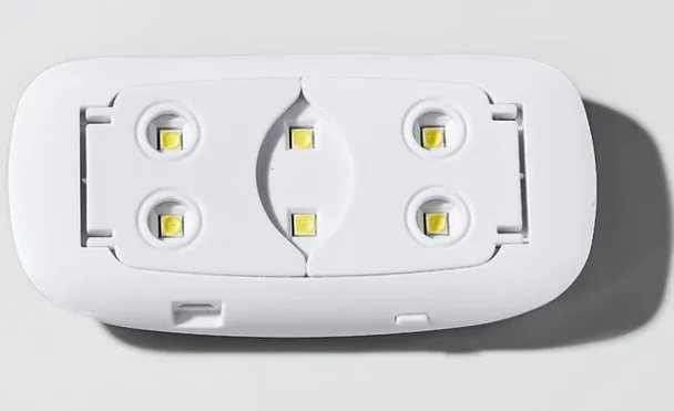 Mini mouse-shaped LED phototherapy machine for nail curing with 6 dual light source lamp beads, available in pink and white, 9W power