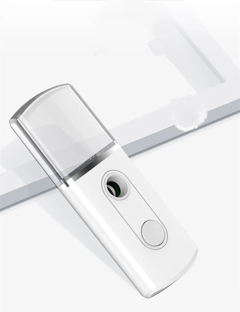 Portable facial nano mist humidifier in white, 10cm long, with 20ml water tank and USB cable