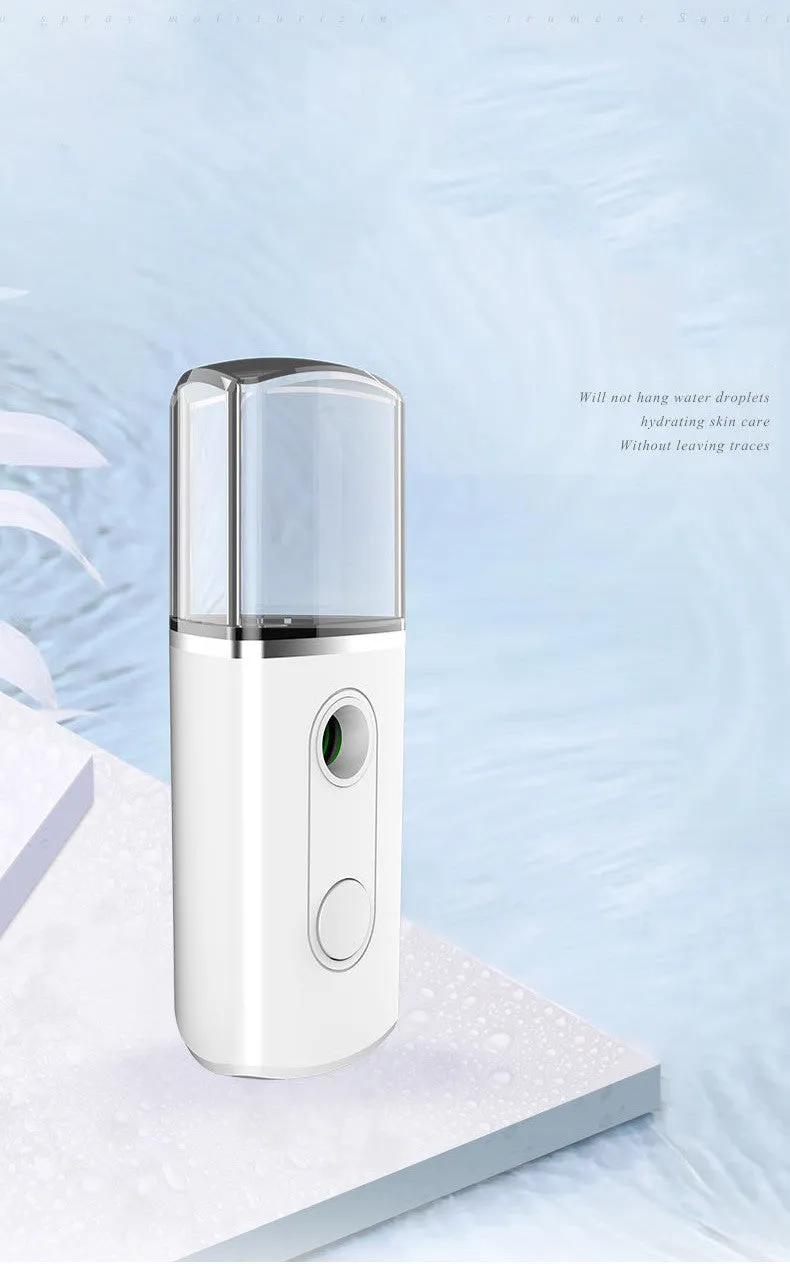 Portable facial nano mist humidifier in white, 10cm long, with 20ml water tank and USB cable
