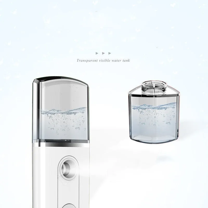 Portable facial nano mist humidifier in white, 10cm long, with 20ml water tank and USB cable
