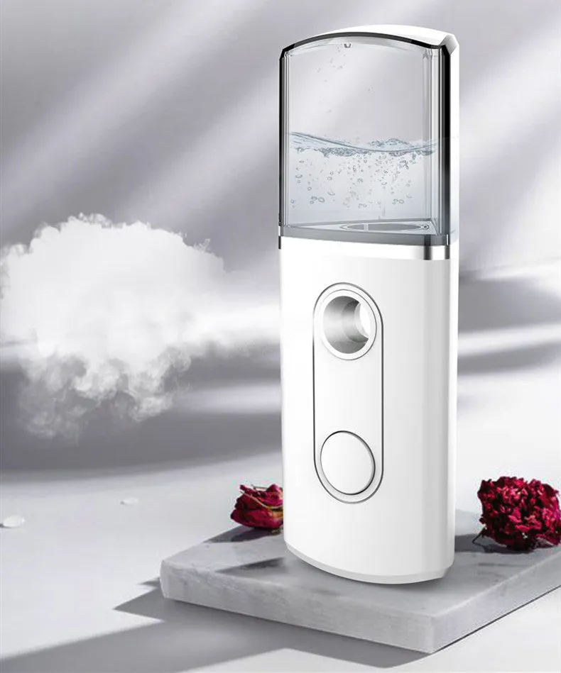 Portable facial nano mist humidifier in white, 10cm long, with 20ml water tank and USB cable