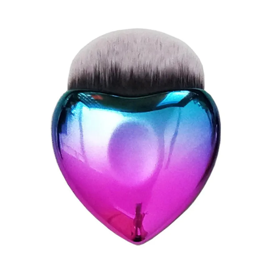 Heart-shaped portable foundation brush with soft bristles for blush and contour application, on a clean background