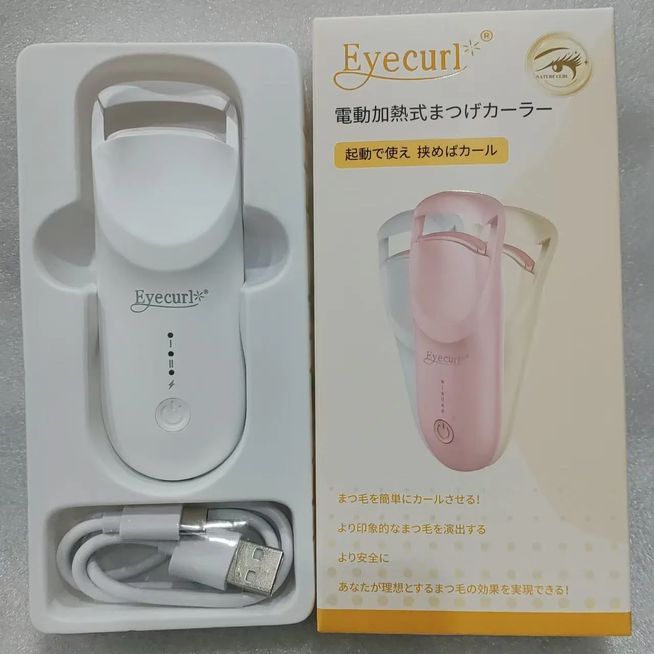 Electric USB-rechargeable eyelash curler in cream white, pink, and apricot colour options.