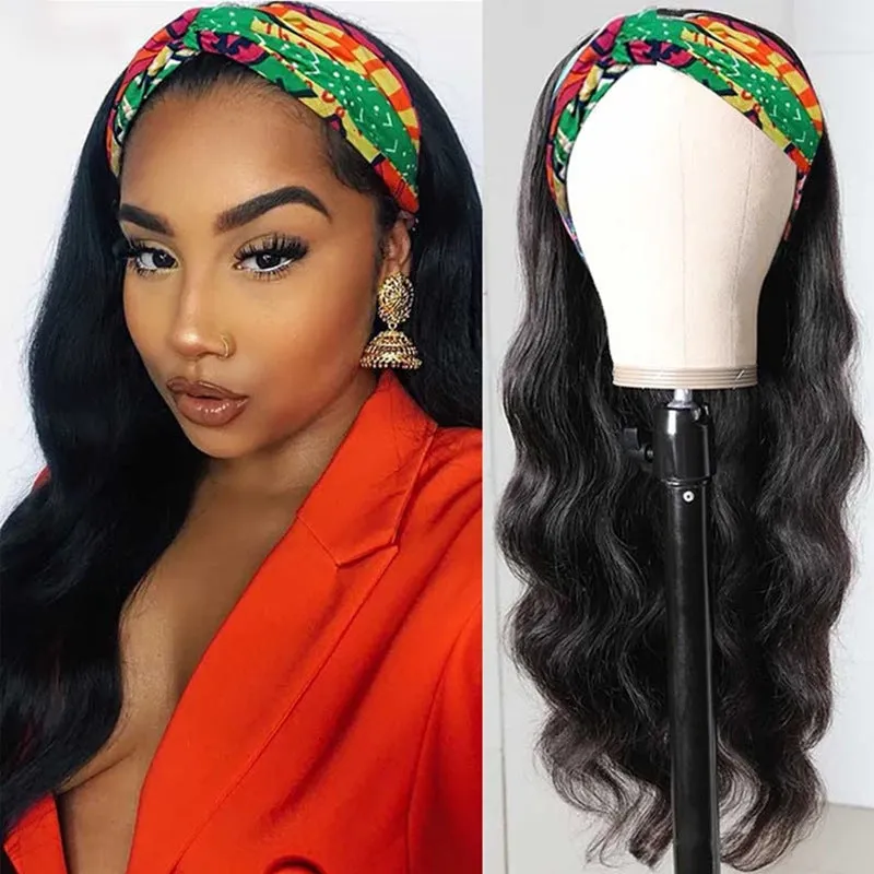 Long curly black synthetic wig with big wave and centred bangs on a head model