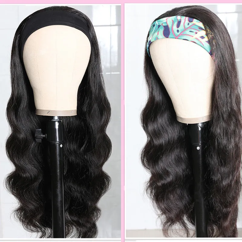 Long curly black synthetic wig with big wave and centred bangs on a head model