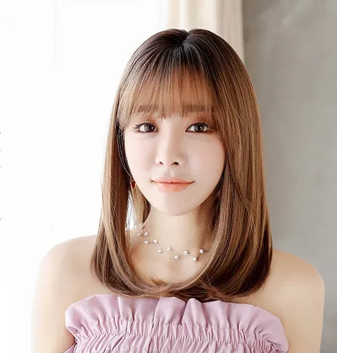 Women's 45cm long straight chemical fibre wig with buckle in honey pudding colour on mannequin head