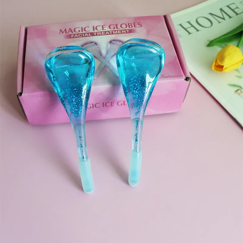 Set of two beauty ice wave ball face massage tools in purple flash finish on white background