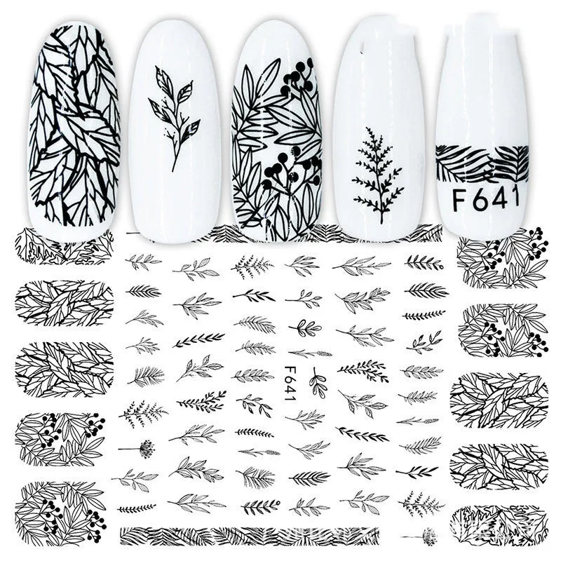 3D hot stamping nail stickers with black and white rose patterns on a hand model