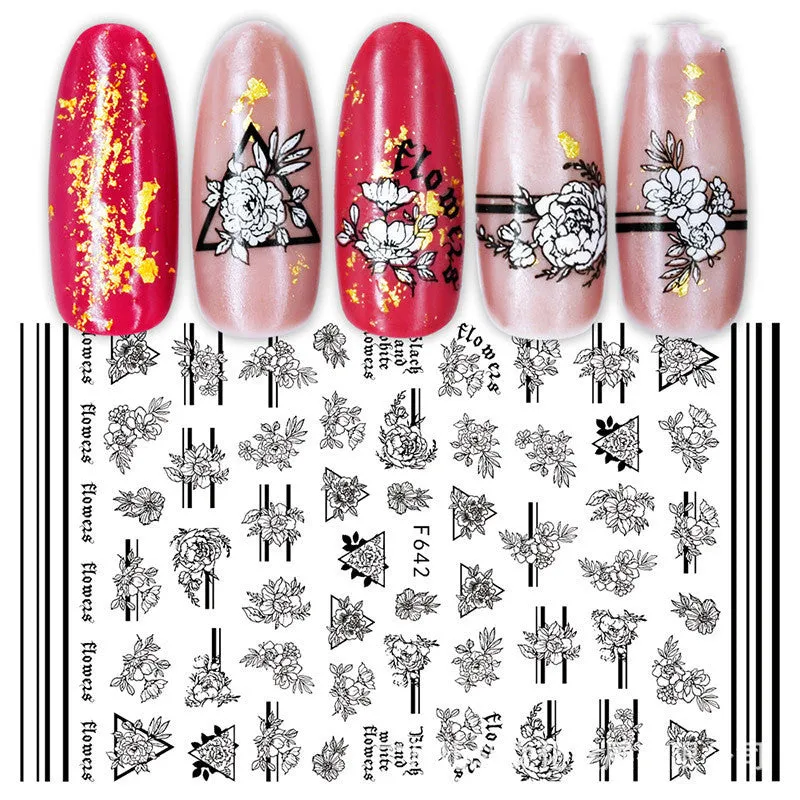 3D hot stamping nail stickers with black and white rose patterns on a hand model