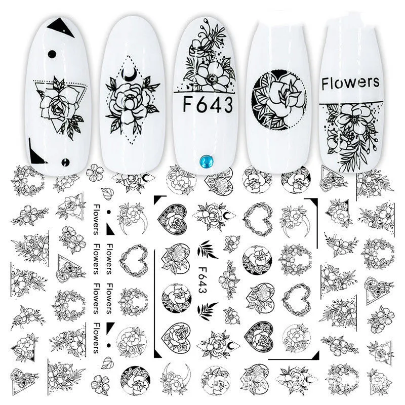 3D hot stamping nail stickers with black and white rose patterns on a hand model
