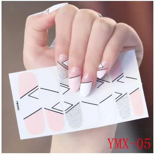 Full nail stickers set of 14 sheets showing 16 colour options in a flat lay arrangement