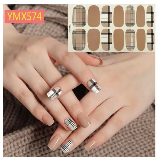 Full nail stickers set of 14 sheets showing 16 colour options in a flat lay arrangement