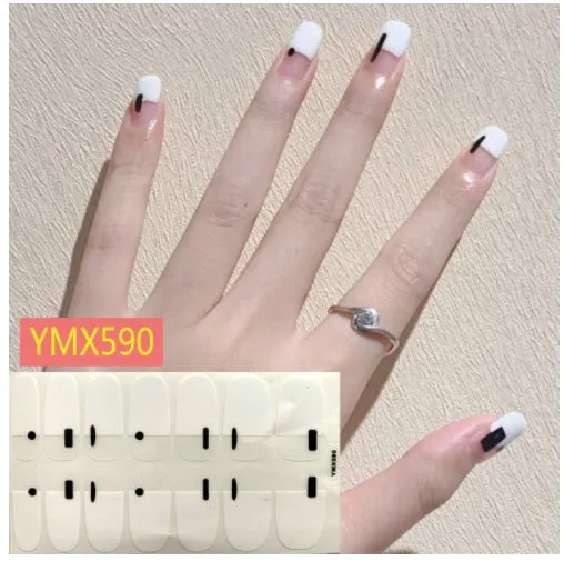 Full nail stickers set of 14 sheets showing 16 colour options in a flat lay arrangement