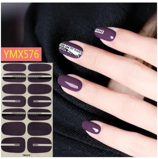Full nail stickers set of 14 sheets showing 16 colour options in a flat lay arrangement