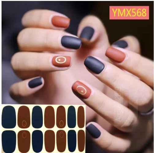 Full nail stickers set of 14 sheets showing 16 colour options in a flat lay arrangement