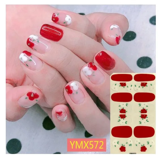 Full nail stickers set of 14 sheets showing 16 colour options in a flat lay arrangement