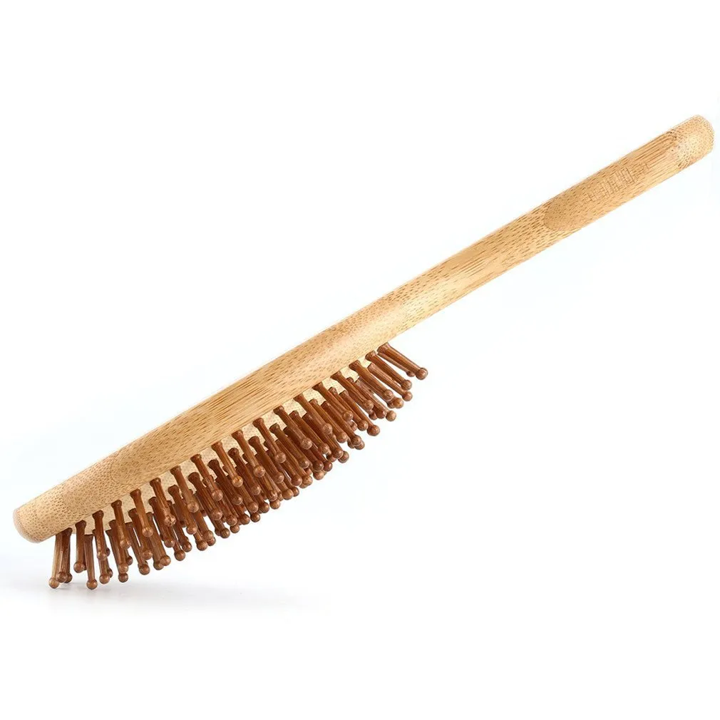 Carbonized bamboo massage comb 66x218mm on a neutral background, showing natural wood texture and teeth