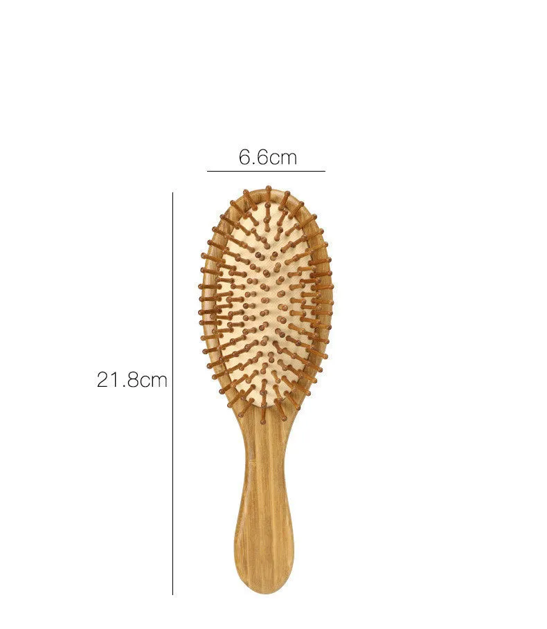 Carbonized bamboo massage comb 66x218mm on a neutral background, showing natural wood texture and teeth