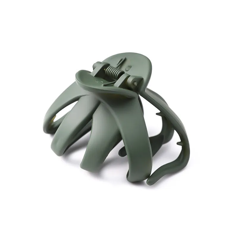 Children's plastic hair clip in small size available in green, dark blue, wine red, black, dark pink, and blue gray.