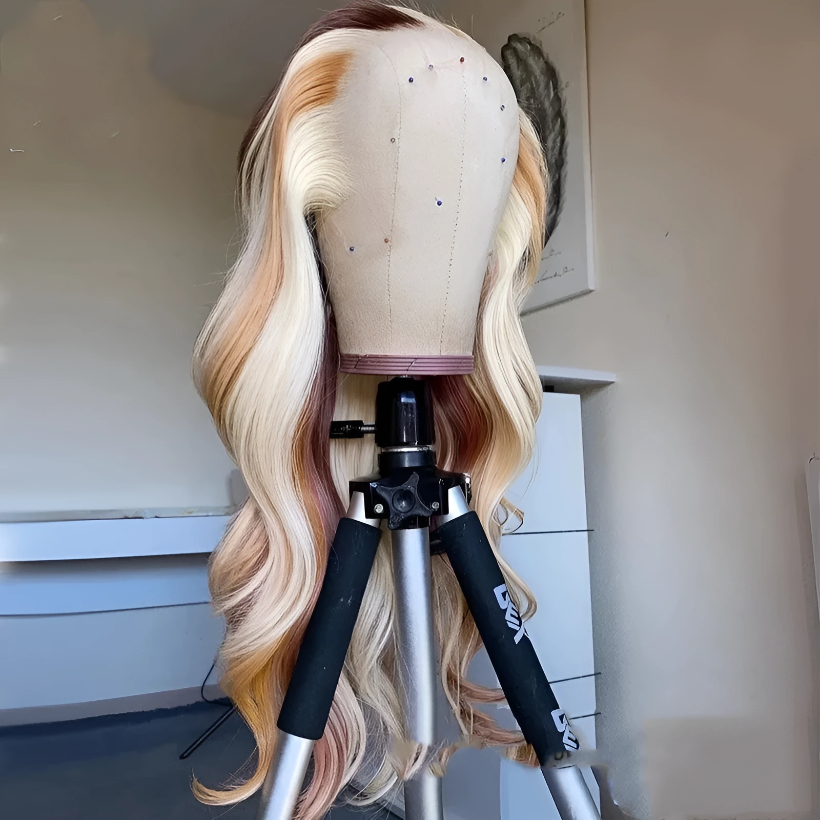 100% human hair body wave lace front wig with blonde highlights, 13X4 lace front, on a mannequin head