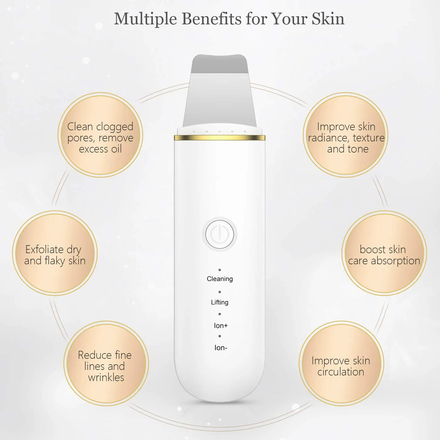 Pore cleansing facial device in golden finish with metal head, resting on a surface with USB cable