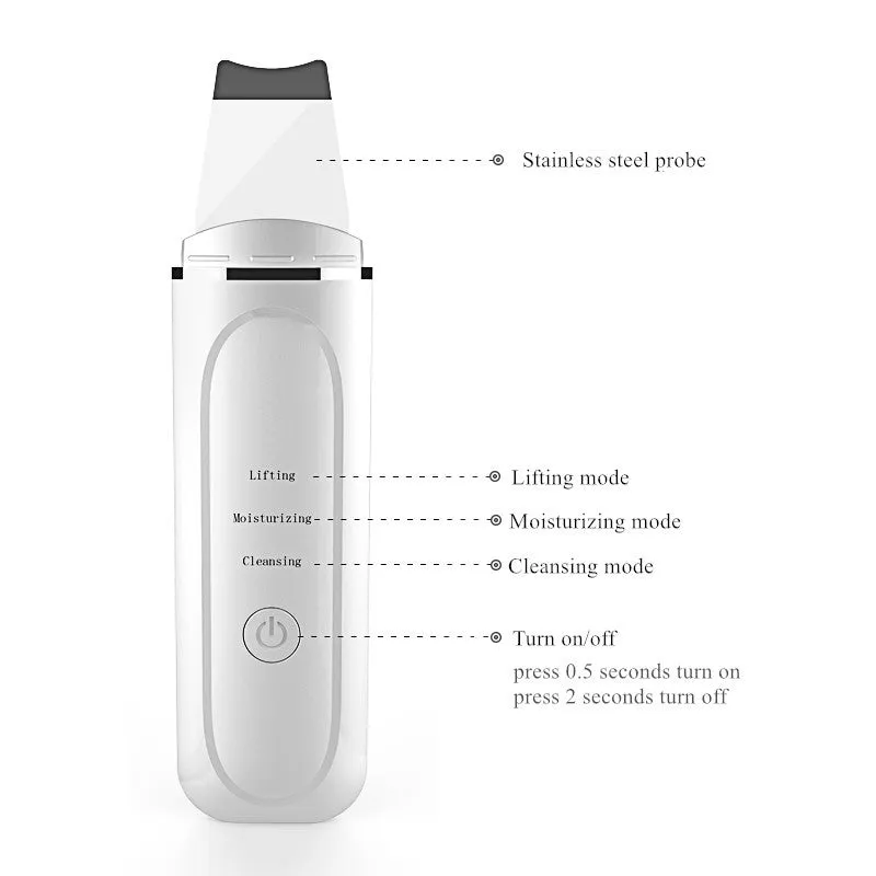 Pore cleansing facial device in golden finish with metal head, resting on a surface with USB cable
