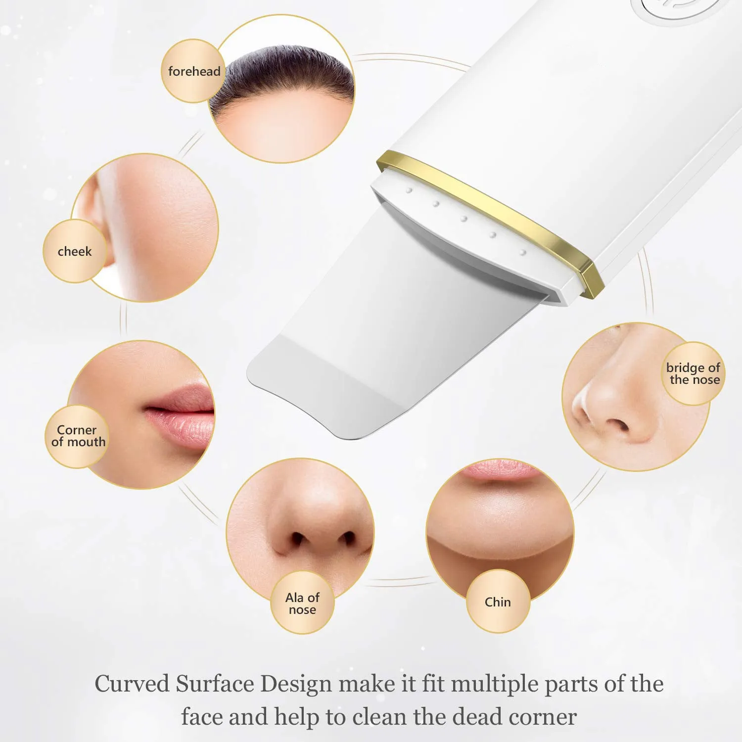Pore cleansing facial device in golden finish with metal head, resting on a surface with USB cable