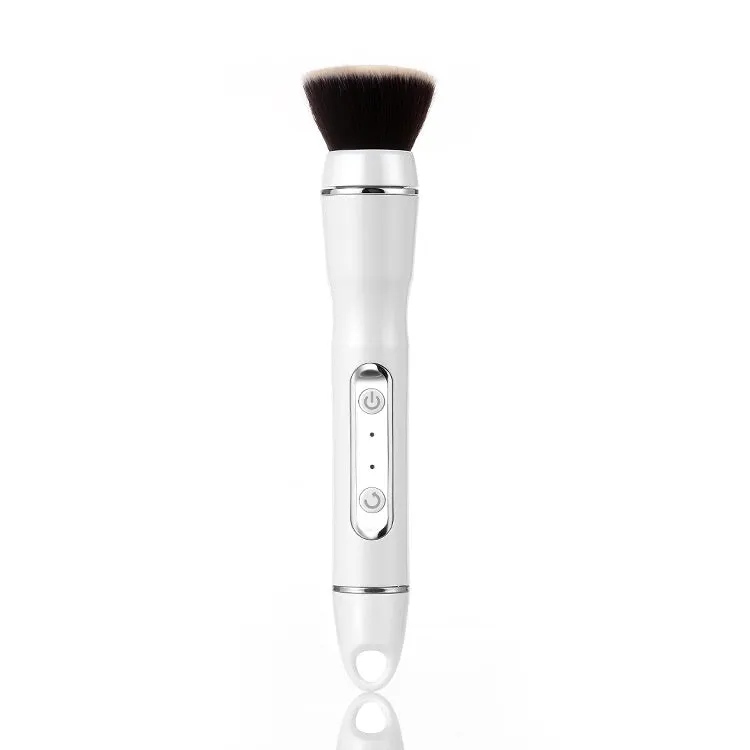 Electric makeup brush with white body, fibre wool bristles, and two rounded brush heads including foundation and blush applicators