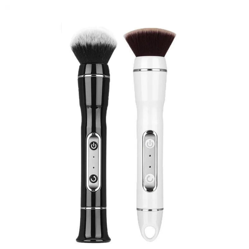Electric makeup brush with white body, fibre wool bristles, and two rounded brush heads including foundation and blush applicators