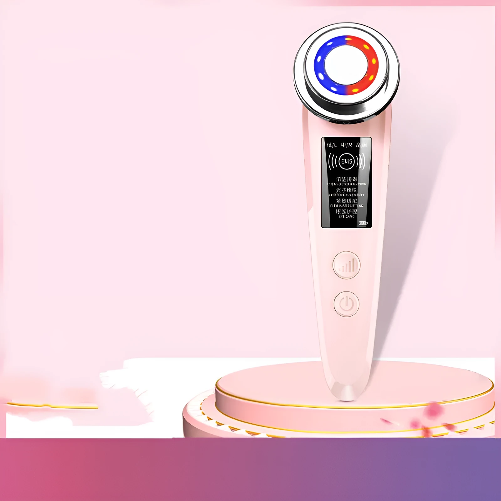 Pink and white rechargeable facial massager with red and blue light therapy functions on a clean surface