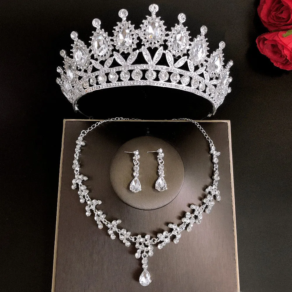 Royal Queen bridal crown necklace earring set made from zinc alloy and rhinestones in pink colour with green sandalwood