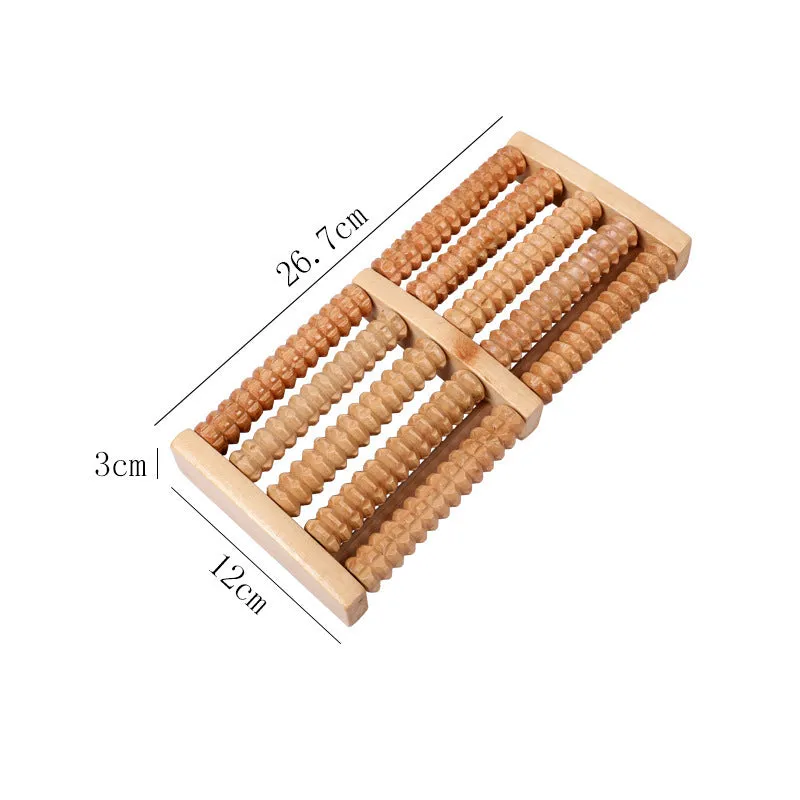 Wooden six-row roller foot massager for acupoint hand massage on a flat surface